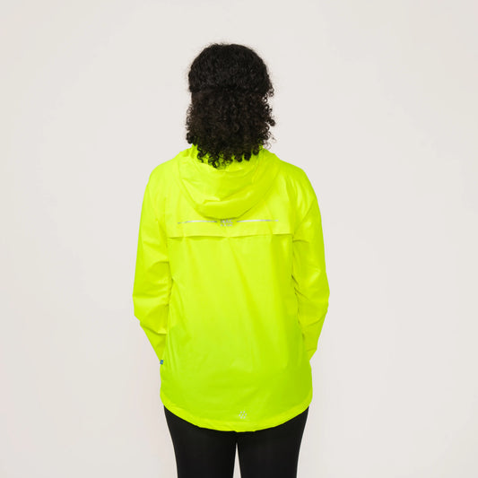 Person wearing a bright neon yellow waterproof and windproof rain jacket displaying the back on a plain background
